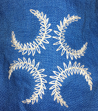 Detail showing the 'Caidan Cross' of laurel wreaths